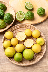 Yellow lime and kaffir lime, Asian citrus fruit 