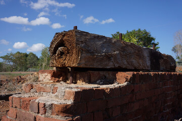 Timber and brick remains at the derelict gold mine at Ravenswood, Queensland, Australia.