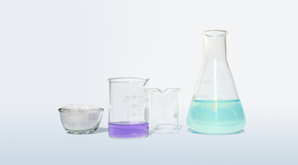 Microcrystalline wax in glass container glass place next to Potassium Permanganate Liquid in beaker...
