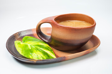 brown cup of coffe