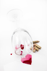 Wine glass and blood, bullet