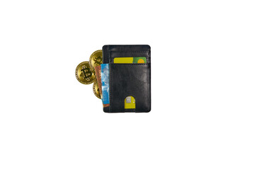 Bitcoin coins and cash in a wallet