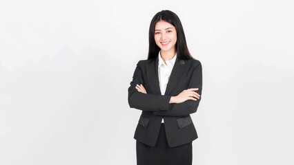 Full length portrait of a business woman , beautiful Asian girl whit suit standing arms crossed...