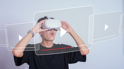 Man using VR glasses virtual reality Global Internet connection metaverse digital technology. watching video clip. Metaverse technology concept Innovation of futuristic.
