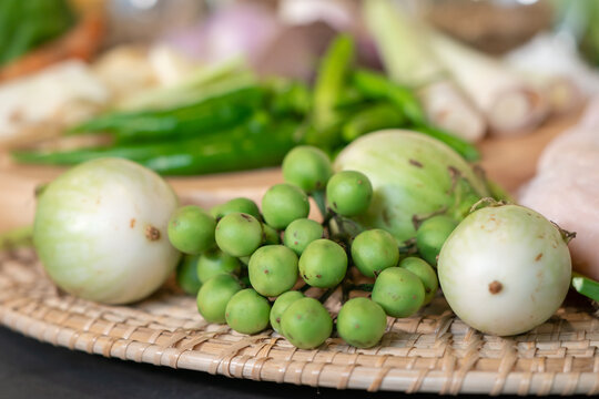 Closeup picture of ingregiants's Thai herbs focusing on eggplants..