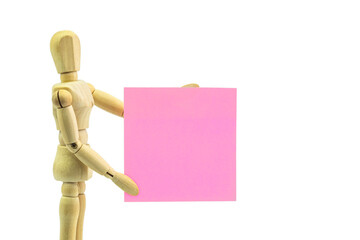 Wooden human dummy manikin with moveable limbs pose holding paper on a white background - 503850172