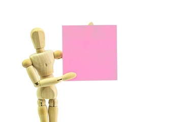 Wooden human dummy manikin with moveable limbs pose holding paper on a white background - 503850174