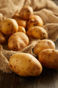 potatoes on a wooden background