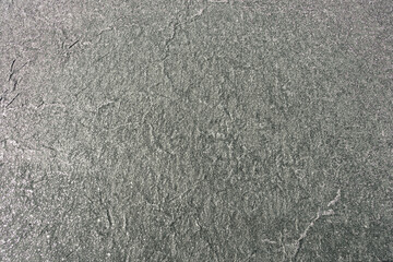 The texture of the salt layer on the shore of the Red Lake (Lake Koyashskoe) in the Crimea. An unusual natural phenomenon of a lake with salt water at the site of an old mud volcano
