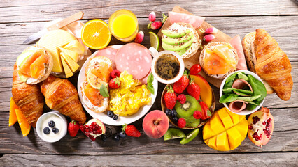 Fototapeta na wymiar health breakfast with fried egg, toast and fruits