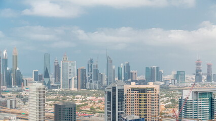Fototapeta na wymiar Rows of skyscrapers in financial district and business bay in Dubai aerial timelapse.