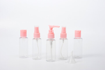 Travel set of plastic transparent containers for cosmetics.