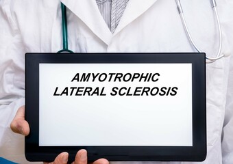 Amyotrophic Lateral Sclerosis.  Doctor with rare or orphan disease text on tablet screen Amyotrophic Lateral Sclerosis
