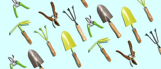 Set of gardening tools on light blue background - obrazy, fototapety, plakaty