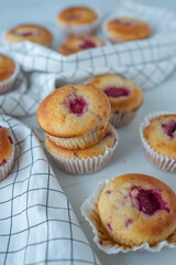 home made almond rhubarb muffins on a table
