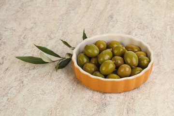 Tasty marinated olives in the bowl