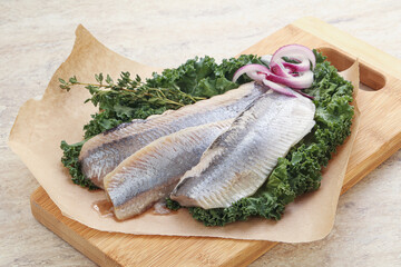 Marinated Herring fillet with onion