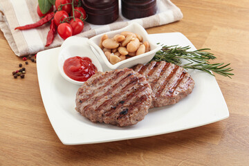 Grilled beef burger cutlet with sauce