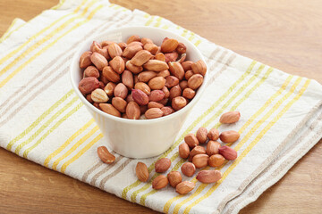 Raw peanut heap in the bowl