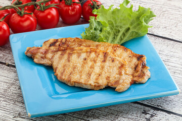 Grilled pork steak with ketchup