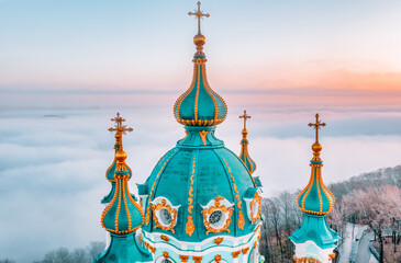 Aerial view of St. Andrew's Church in heavy fog, Kyiv, Ukraine. Concept, travel, tourism