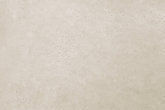 Beige stone texture background. Wide banner with soft concrete grunge pattern on copy space