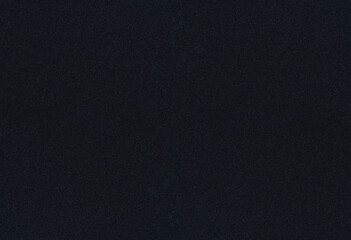 black coarse paper macro background