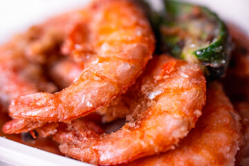 Fried king shrimps close-up, tasty, crispy, large, photo with shallow depth of field. Delicious food concept.