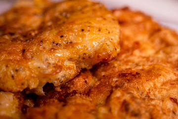 Milanese beef cutlet, tasty, appetizing, juicy, crispy. Selective focus, shallow depth of field. Delicious food concept