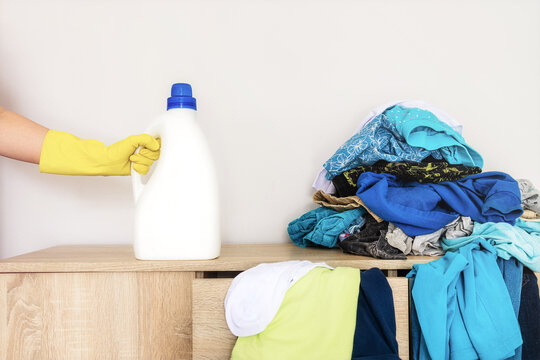 laundry detergent bottle mockup on dirty clothes background, Close-up