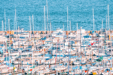 San Francisco, California, USA - October 16, 2021, view of rows of yachts in San Francisco Bay, California. Photo processed in pastel colors