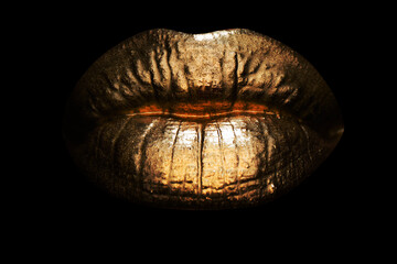Female golden mouth isolated. Woman sensual gold lips. Creative art glitter lipstick.