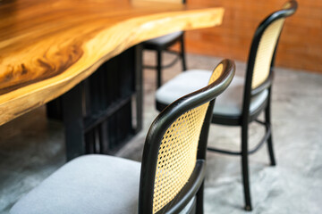 Set of classic style chair with crafted bamboo backrest part. Interior decoration object photo....