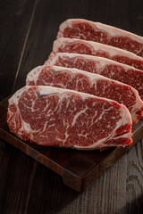 raw beef meat on a cutting board