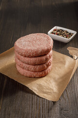 raw minced meat on wooden board