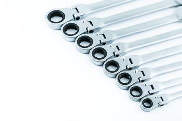 set of spanners on white background. cap wrenches with ratchet