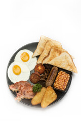 traditional english breakfast food plate on white background