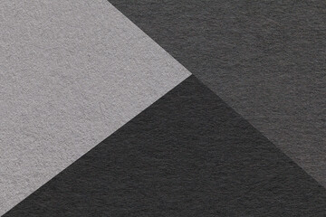 Texture of craft pastel gray and black colors paper background, macro. Structure of vintage grey...