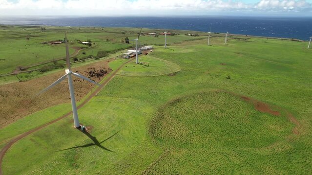 Aerial view Hawi alternative energy wind farm Hawaii island pasture overlooking Pacific ocean