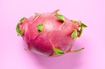 Fototapeta premium Halves of Fresh organic Dragon Fruit on a blue background.