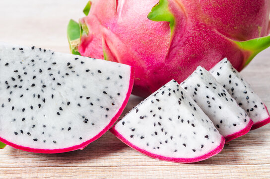 Tropical dragon fruit or pitaya on wooden wooden background