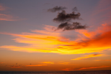 Sunset or sunrise sky clouds over sea sunlight in Phuket Thailand Amazing nature landscape seascape Colorful sky