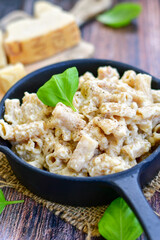   Gluten free Chickpea pasta.Fresh  low carb  high protein pasta rigatoni alla carbonara with  cream sauce  , becon  egg, parmesan cheese ,olive oil and black pepper) 
