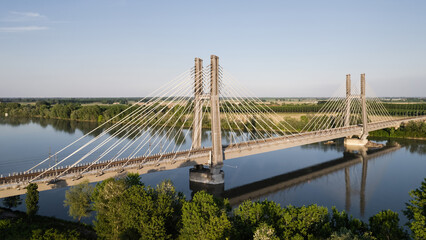 The cable stayed bridge over Po river, high speed train railroad.