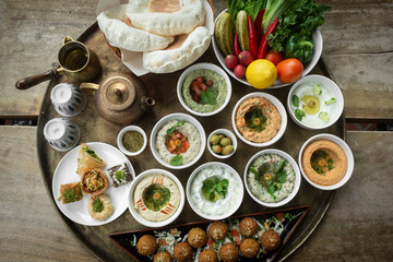 mixed middle eastern meze sharing food platter in turkish restaurant