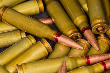 Heap of the service rifle cartridges, fragment close-up