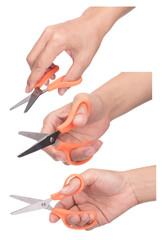 Set of Hand holding Orange scissors isolated on white background