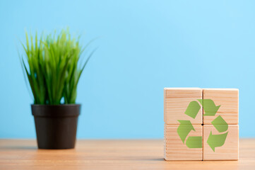 Save the nature. Circular economy concept, recycle, environment, reuse, manufacturing, waste, consumer, resource. Sustainable development. Wooden cubes; the symbols of circular economy