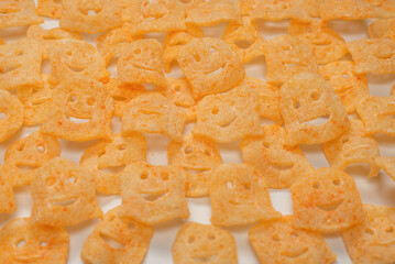 Crispy salted snacks on white background.