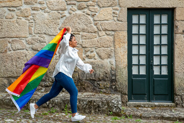Obraz na płótnie Canvas women with lgtb rainbow flag
